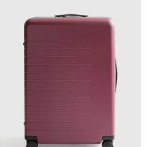 New, in box Quince hard shell suitcase